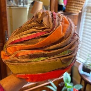 Christian Dior chapeaux with tulle & Orange, brown, and green ribbon Trim